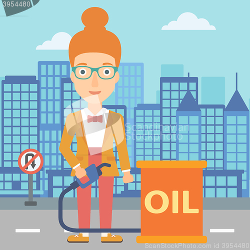 Image of Woman with oil can and filling nozzle.