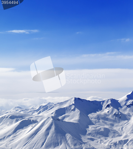 Image of Snowy mountains in sunny day