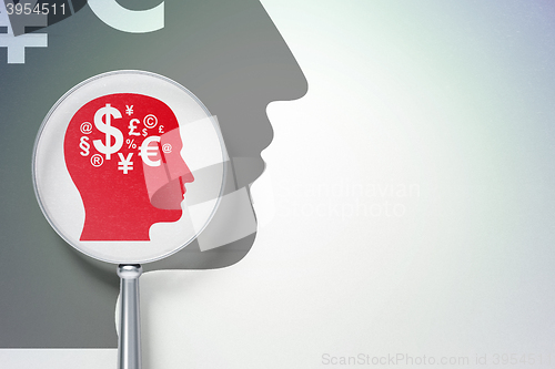 Image of Learning concept:  Head With Finance Symbol with optical glass on digital background