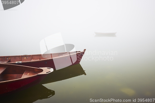 Image of Boats in mysterious fog