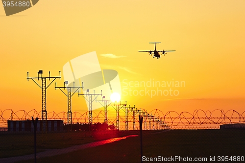 Image of Airplane at the sunset 