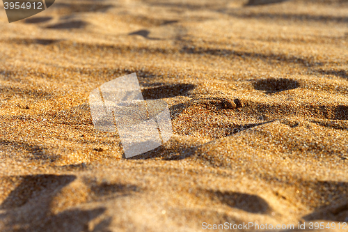 Image of Sand on beach in sun summer day