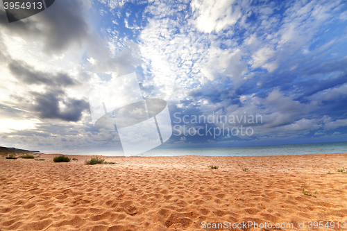 Image of Sea beach in sun evening