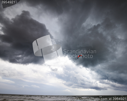 Image of Power kite in sea and storm sky