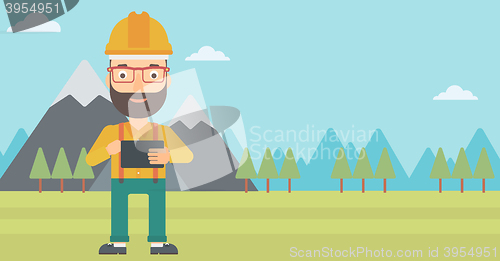 Image of Man holding tablet computer.
