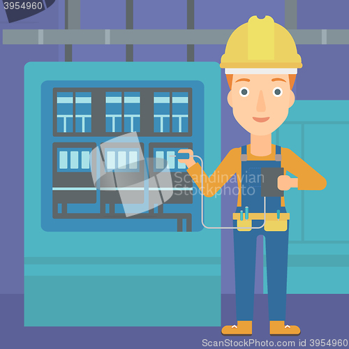 Image of Electrician with electrical equipment.