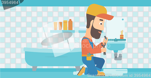 Image of Man repairing sink.