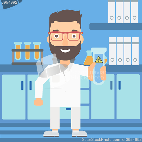 Image of Laboratory assistant with test tube.