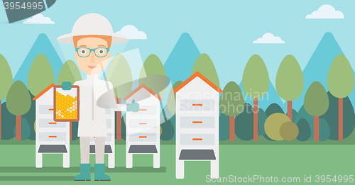 Image of Bee-keeper at apiary.