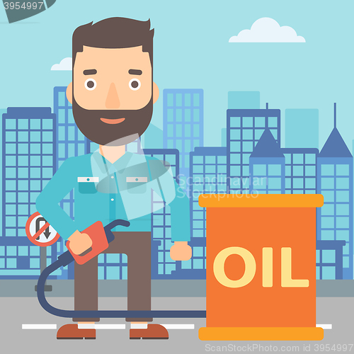 Image of Man with oil can and filling nozzle.
