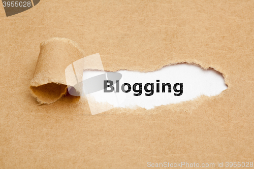 Image of Blogging Torn Paper Concept