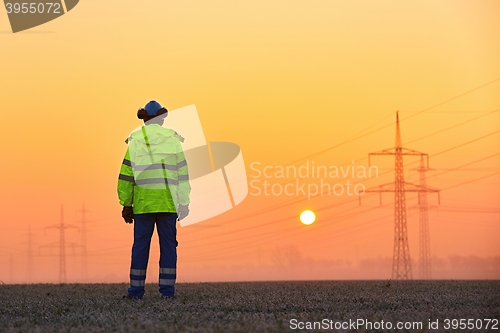 Image of Worker at the sunrise