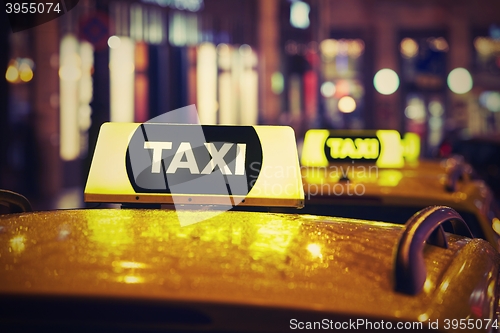 Image of Taxi car at night