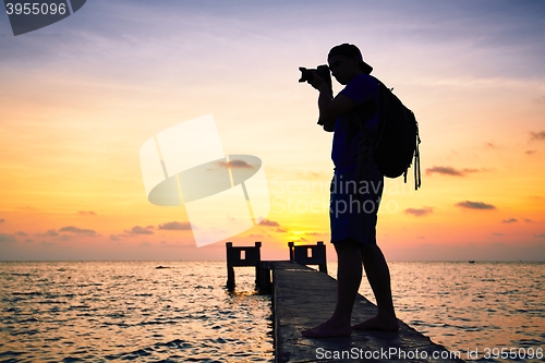 Image of Photographer at the sunset