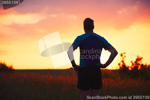 Image of Pensive runner at the sunset