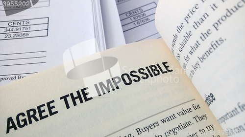 Image of Agree the impossible word on the book 