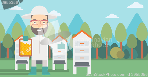 Image of Bee-keeper at apiary.