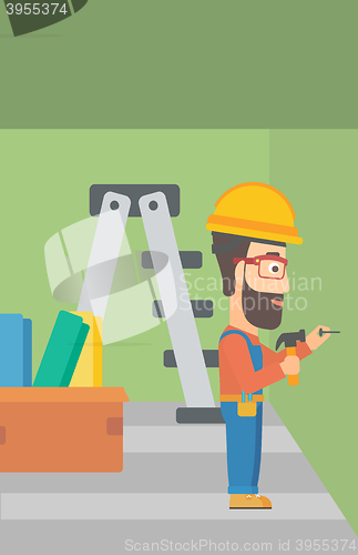 Image of Constructor hammering nail.