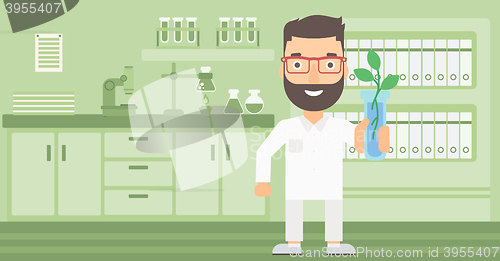 Image of Laboratory assistant with test tube.