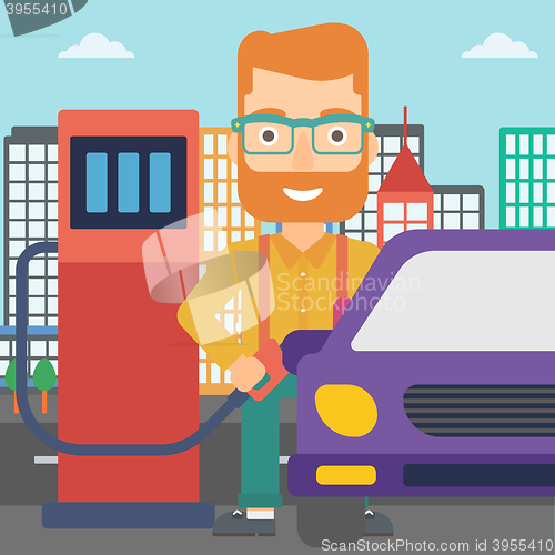 Image of Man filling up fuel into car.