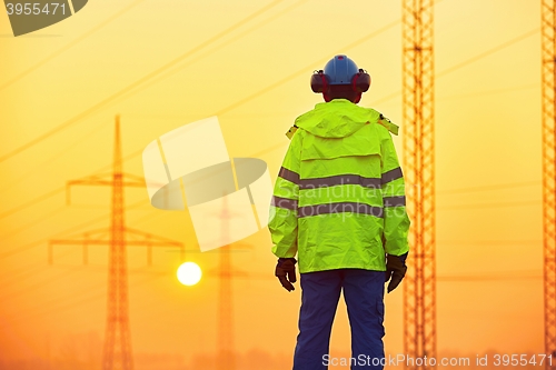 Image of Worker at the sunrise