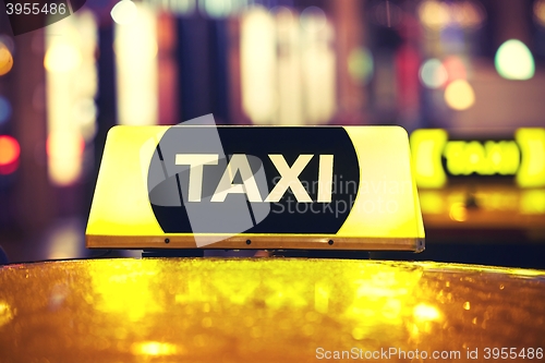 Image of Taxi car at night