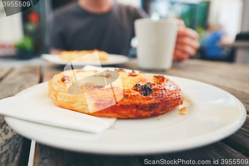 Image of Morning coffee with with sweet pastries