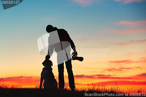 Image of Photographer with dog