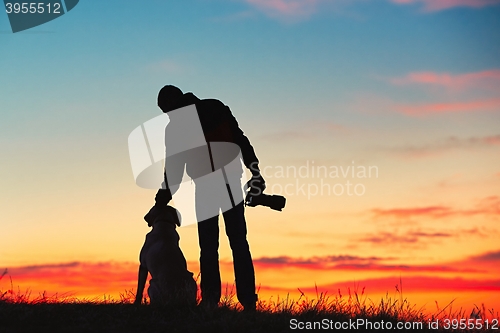 Image of Photographer with dog