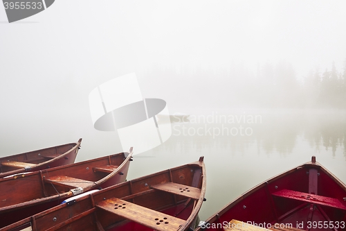 Image of Boats in mysterious fog