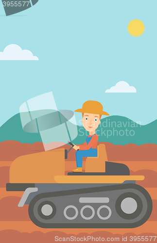 Image of Farmer driving tractor.