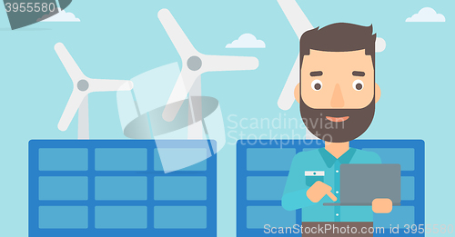 Image of Man using laptop.