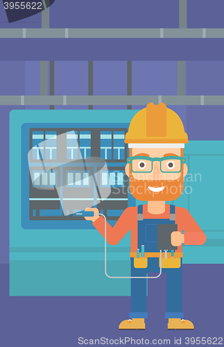 Image of Electrician with electrical equipment.