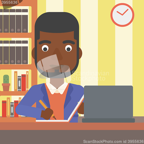 Image of Man using laptop for education.