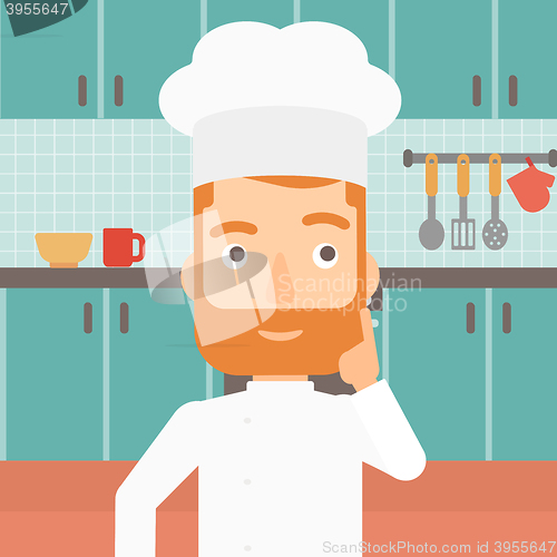 Image of Chef pointing forefinger up.