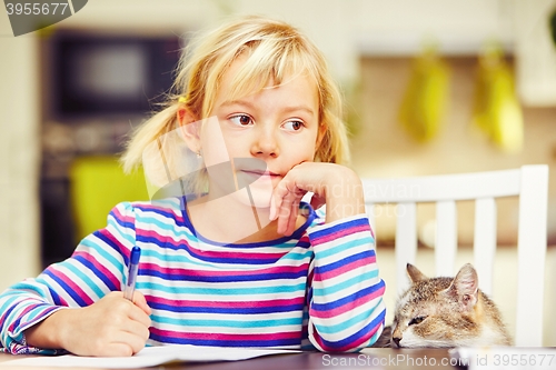 Image of Girl is doing homework 