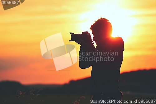 Image of Silhouette of the photographer