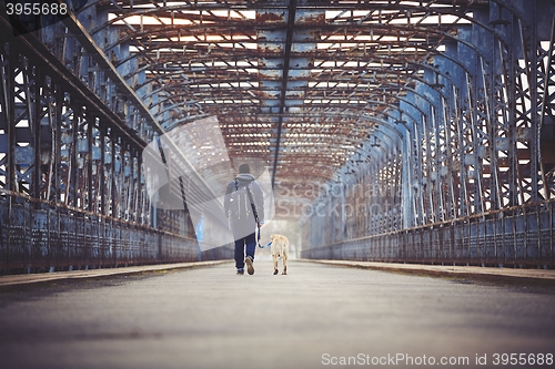 Image of Man with his dog