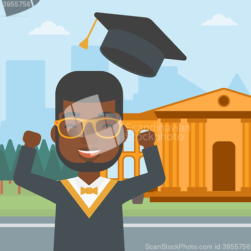 Image of Graduate throwing up his hat.