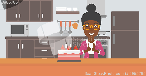 Image of Woman looking at cake.
