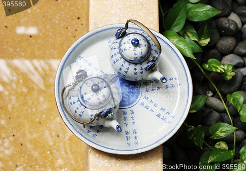 Image of Asian pottery tea set.