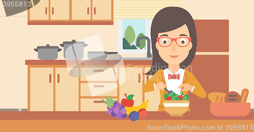 Image of Woman cooking vegetable salad.