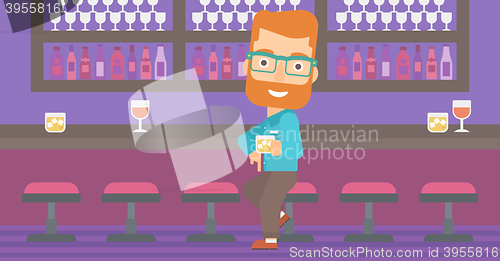 Image of Man sitting at bar.