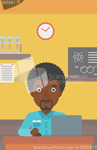 Image of Man studying with laptop.