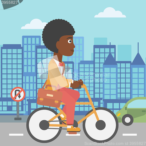 Image of Woman cycling to work.
