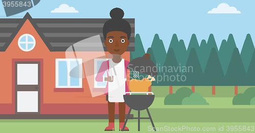 Image of Woman preparing barbecue.