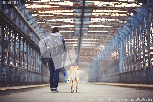 Image of Man with his dog