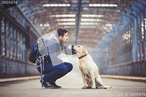 Image of Man with his dog