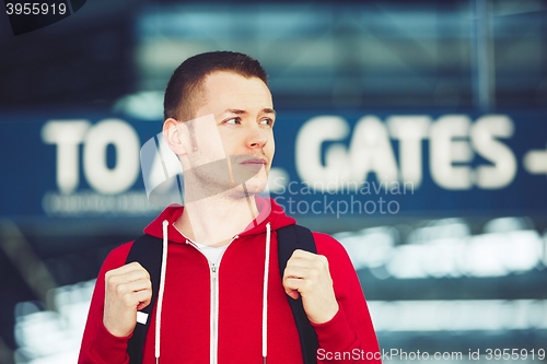 Image of Handsome traveler at the airport