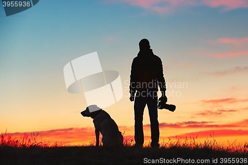 Image of Photographer with dog